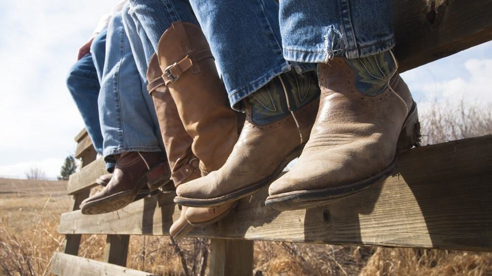 Everyone's Tucking Their Pants Into Boots, Here's Why